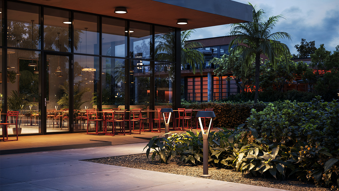 Luminis Clermont fixtures light outside of an urban building