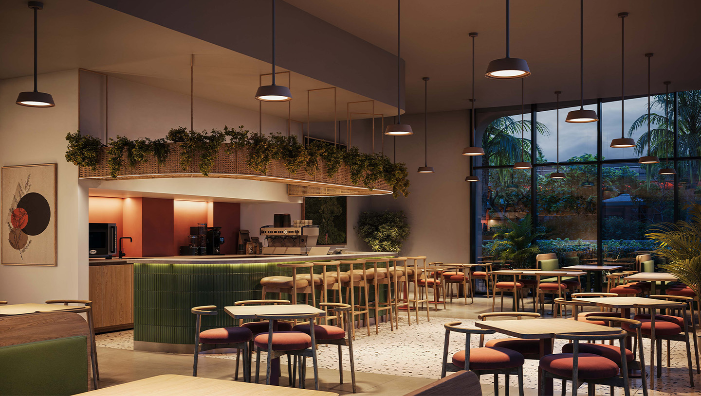 Clermont lighting illuminate a warm, modern common area with kitchen