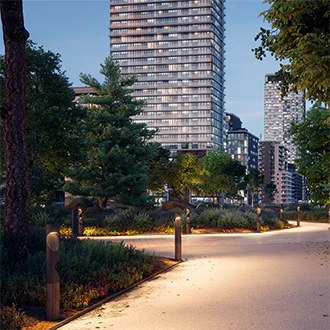 Inline bollards light pathway in garden area