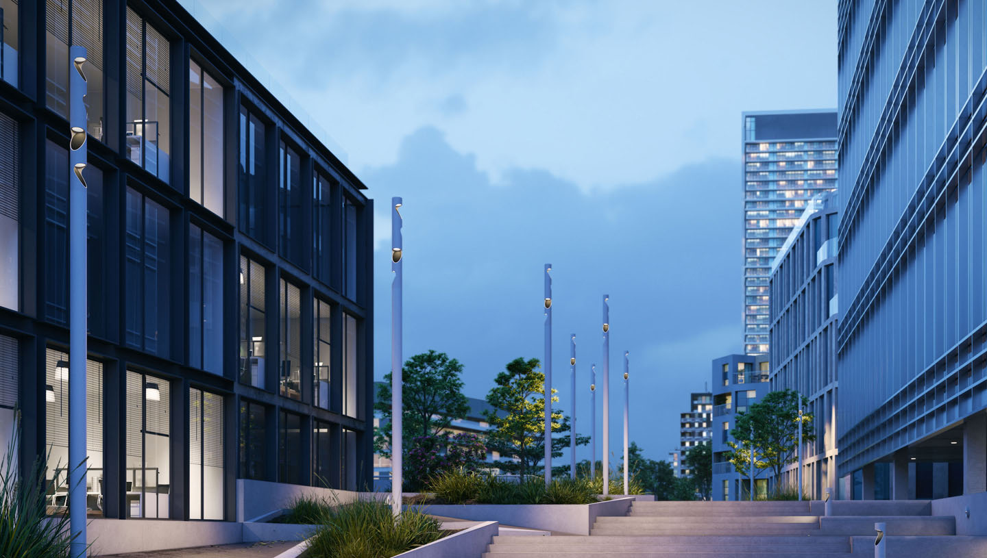 Inline columns by Luminis bring illumination to plaza at dusk