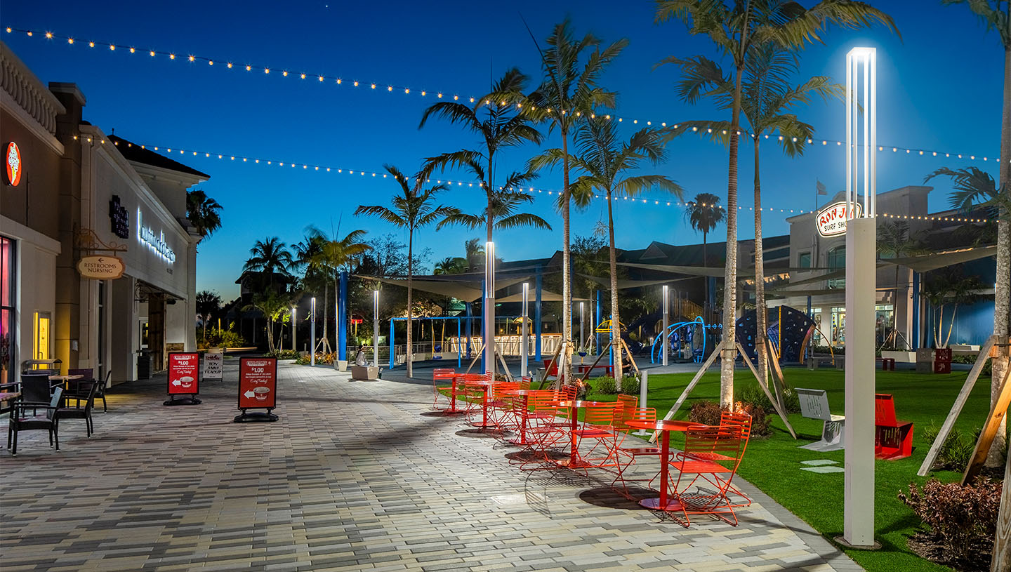 Lumiquad by Luminis lights outdoor shopping center at night