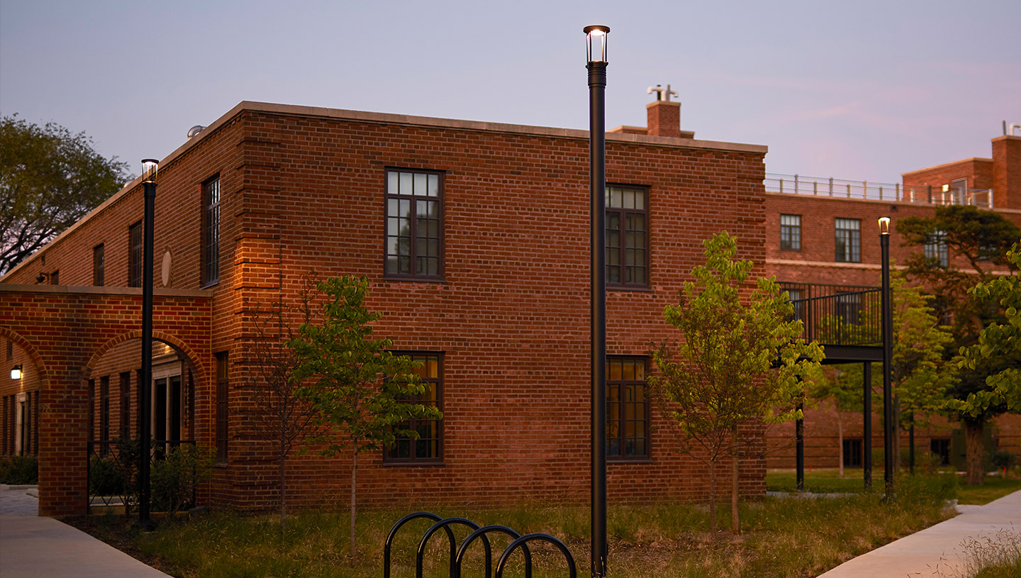 Walkway at dusk illuminated by Eclipse luminaire