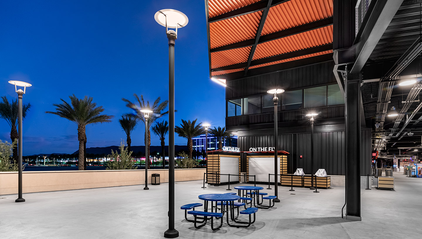 Eclipse pole-mounted fixtures light outdoor concourse