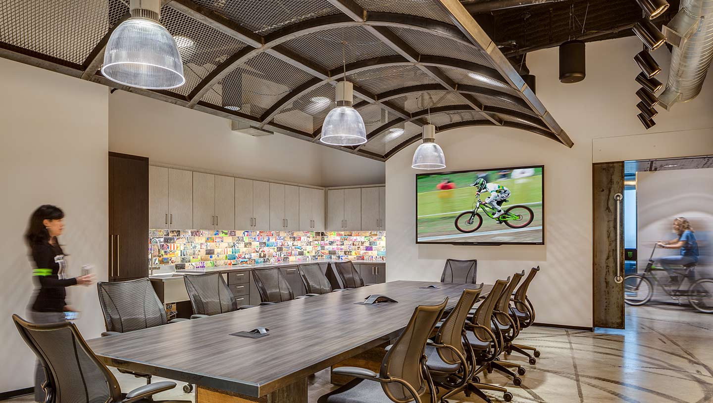 Prisma ceiling pendants illuminate conference room