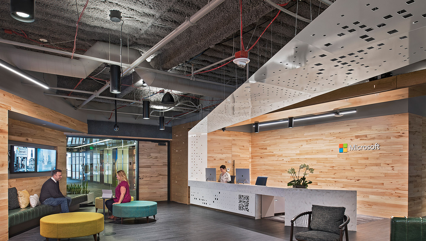 Syrios Pro pendants by Luminis lights common area in office