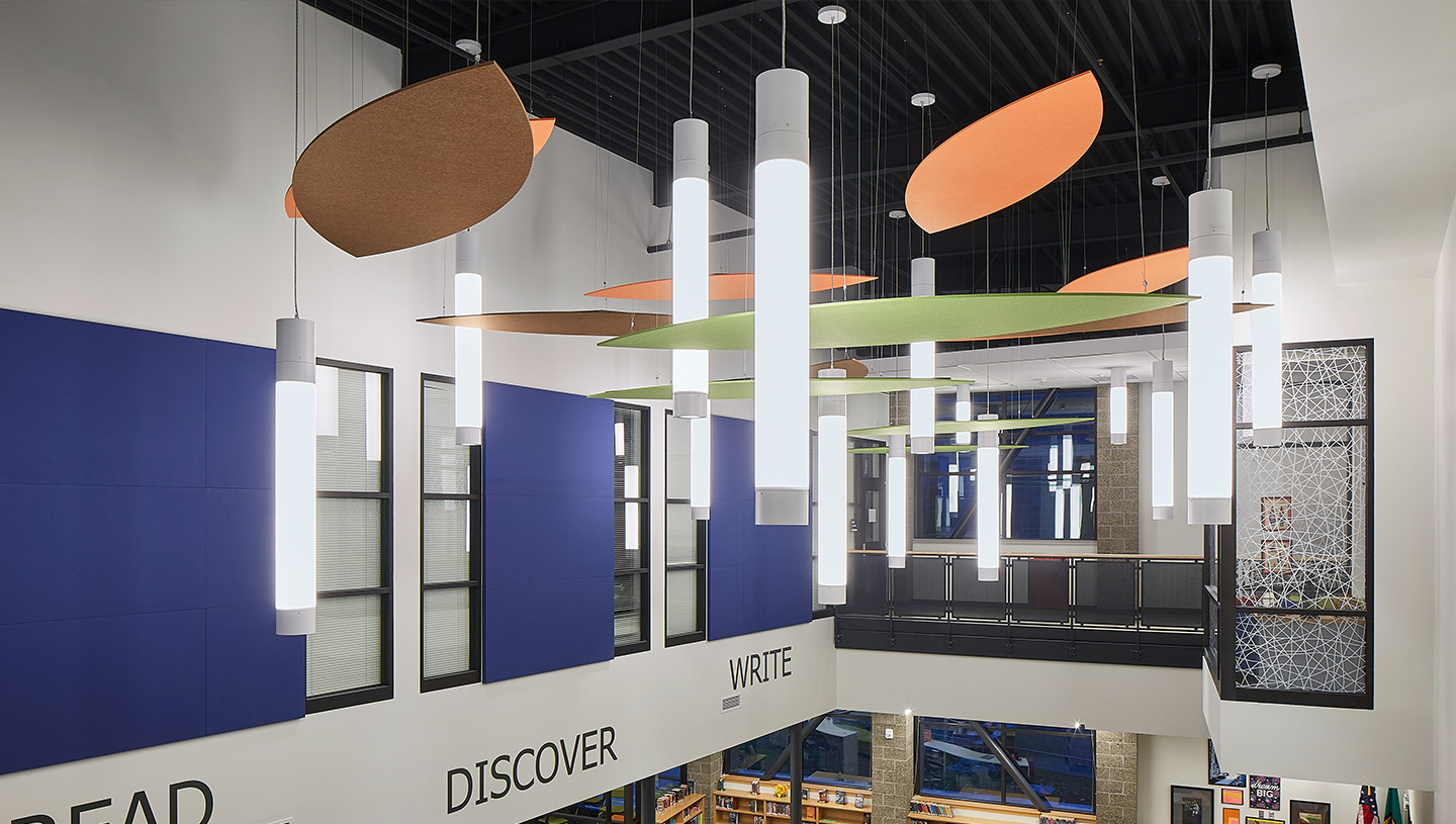 Lumistik pendants illuminate large open interior space in school